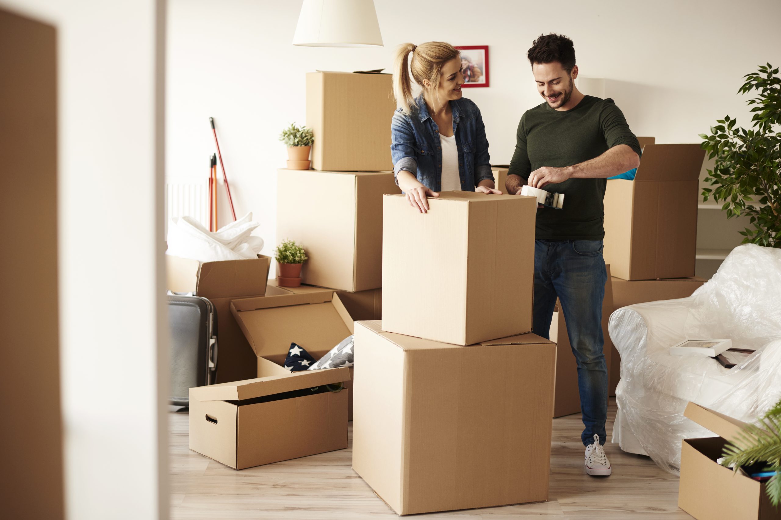 image showing people moving in to a new home
